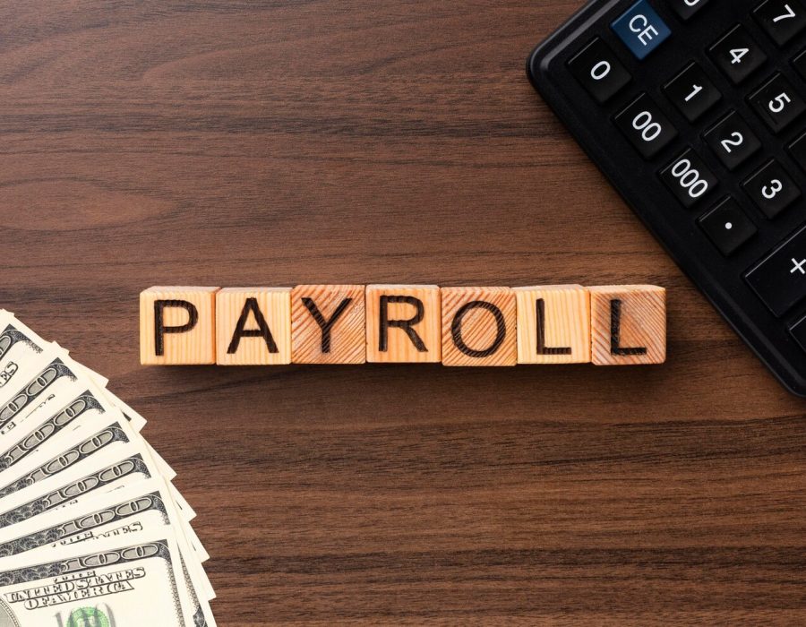top-view-payroll-concept-with-cash-calculator_23-2149103971